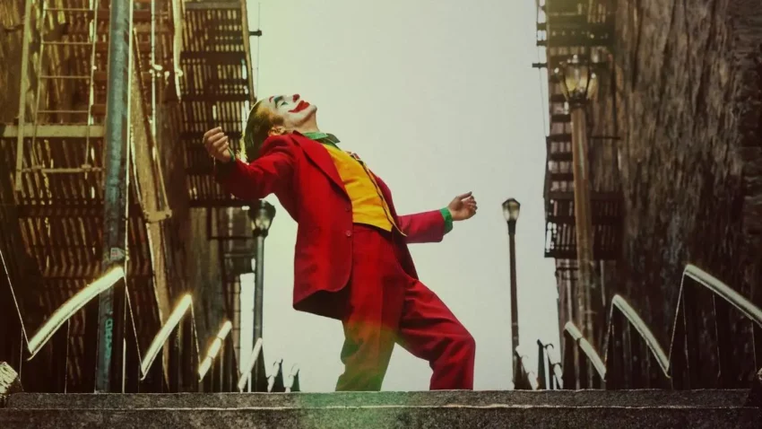 Bannière pour le film Joker réalisé par Todd Phillips avec Joaquin Phoenix.